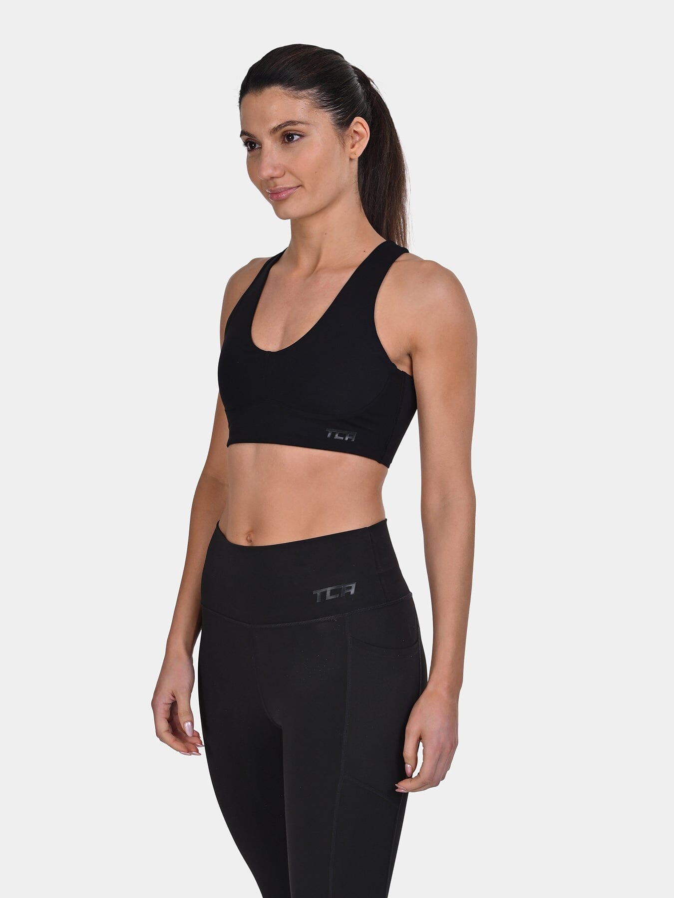 TCA Racerback Sports Bra for Women ā Seamless Wireless Bra with Removable Pads for Yoga, Pilates & Low-Impact Training