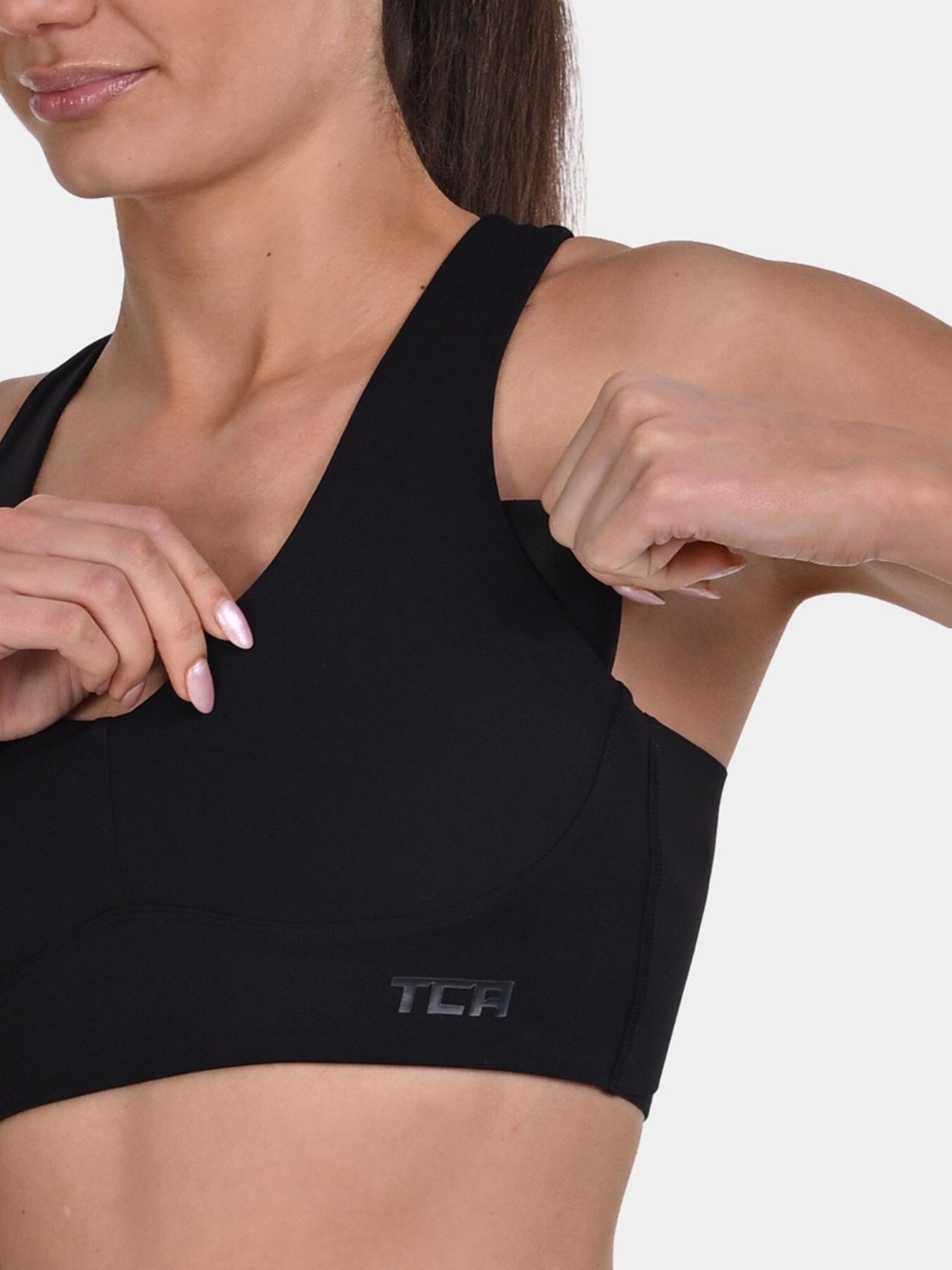 TCA Racerback Sports Bra for Women ā Seamless Wireless Bra with Removable Pads for Yoga, Pilates & Low-Impact Training